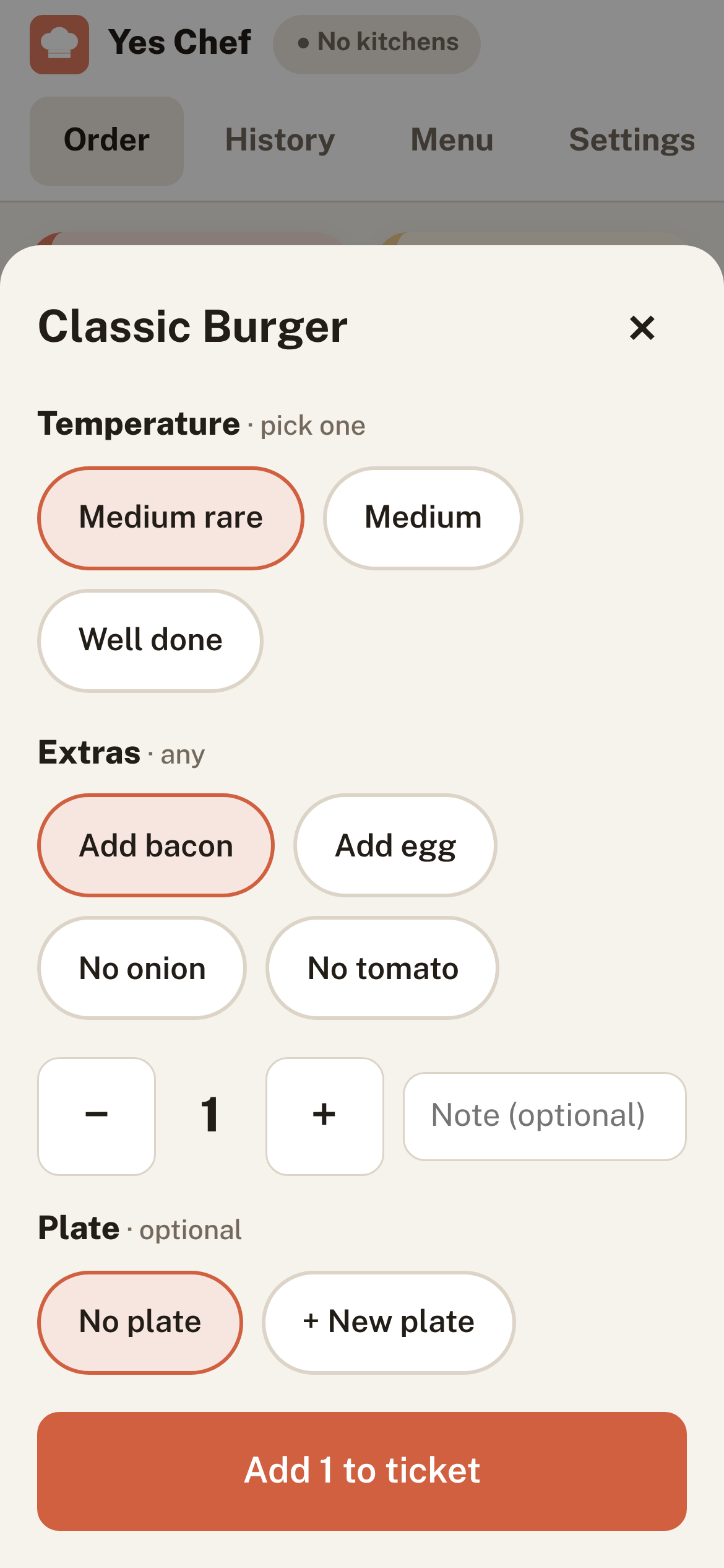 Yes Chef on a phone, choosing Medium rare and Add bacon for a Classic Burger.